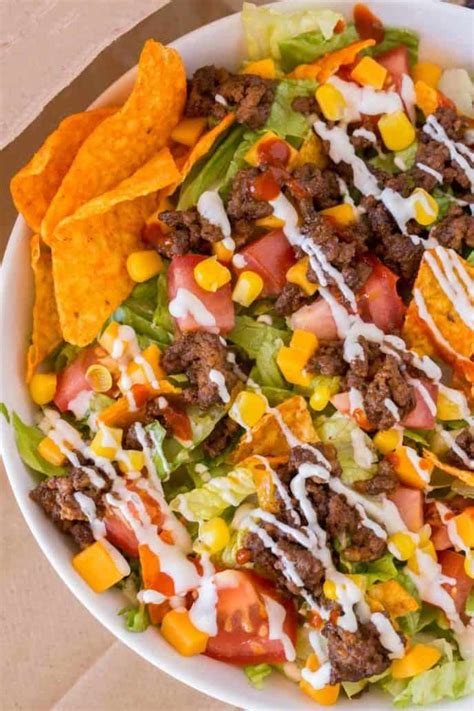 Is it sweet or is it savory? Taco Salad is the perfect weeknight meal or lunch made with ground beef, nacho chips, beans ...