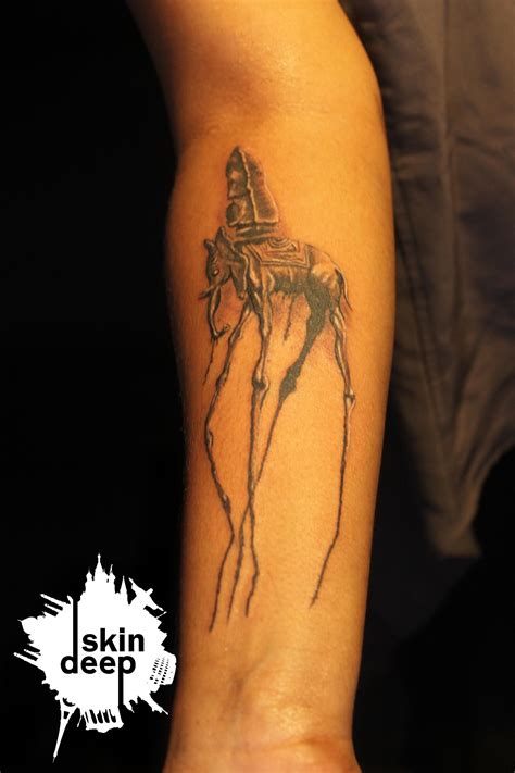 Black and grey dali elephant tattoo on side rib. dali elephant tattoo | Tatuaggi coordinati, Tatuaggi