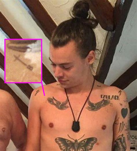 We had 10 people style a $24 tulle skirt and the results will have you wanting it in your closet asap. Harry Styles Shows Off Tiny Cross and Letter "B" Tattoo on ...