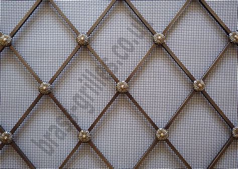 It is woven from flat brass wire. Regency Brass Grille, Decorative Metal by Brass Grilles UK