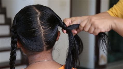 Boy, have we got the indulgent hair gallery for you. Female Hand Braiding Hair of Stock Footage Video (100% ...
