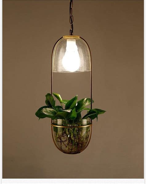 Simply drill a hook and voila, a floating plant. Lileas - Modern Hanging Planter Lamp in 2020 (With images ...