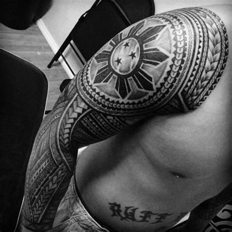 Flower and filipino tattoo on left half sleeve. 50 Filipino Sun Tattoo Designs For Men - Tribal Ink Ideas