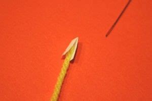 Push the folded end of the paper through the eye of the needle. Quick Tip - How to thread yarn through a needle | Knitting ...