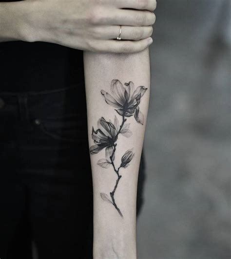 The most common colors for a magnolia tattoo are white, black, black and white, and pink. 44 Beautiful Magnolia Tattoo Designs | Page 2 of 4 ...