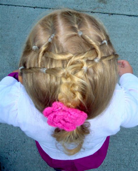 The rubber band hairstyle looks as good when paired with a curly natural ponytail as it does with a sleek, straight one. Toddler Hairstyles: Neon Green Rubber Bands!