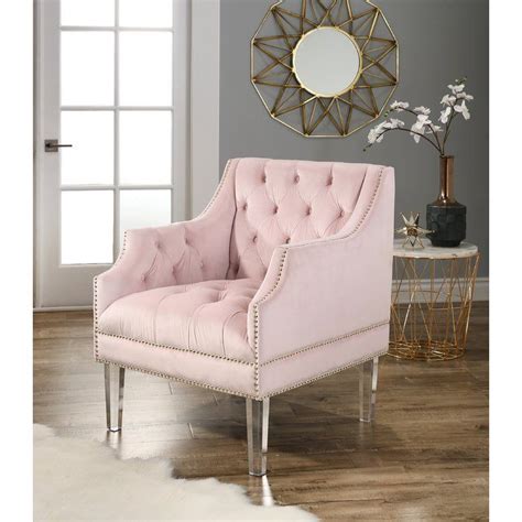 The wingback design and tufted luxe velvet material are both classic and chic. Ayana Armchair | Velvet tufted chair, Velvet chair, Pink chair