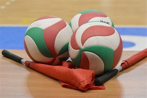 Each team tries to score points by grounding a ball on the other team's court under organized rules. Basic Volleyball Rules for Coaches and Players (Easy to Learn)