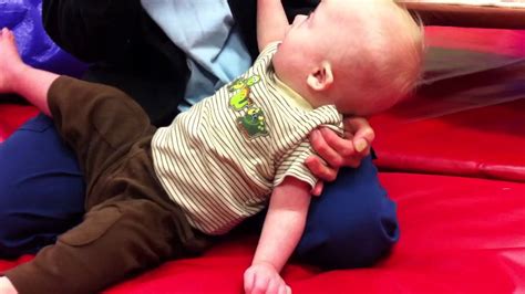 Occupational therapists and physical therapists work closely together to help the young child develop gross motor milestones (eg: Baby with Down Syndrome learning to crawl at physical ...