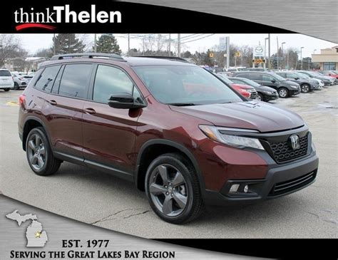 Every used car for sale comes with a free carfax report. 2019 Honda Passport now for sale at Thelen Honda in Bay City