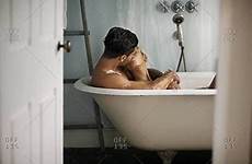 couple bathtub kiss kissing young lying bath tub offset fr model cuddles questions any long