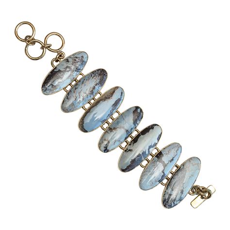 beautiful-aztec-lapis-lazuli-bracelet-set-in-gold-tone-metal-semi-precious-stones-on-antique