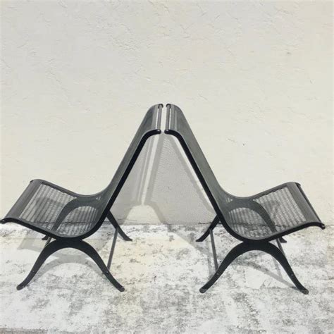 Whether you are looking for antique furniture in london, or anywhere else, you will find one of the most comprehensive ranges of products that surpasses anything that you will see in your average antique furniture store. Pair of Salterini Curule Wrought Iron Lounge Chairs ...