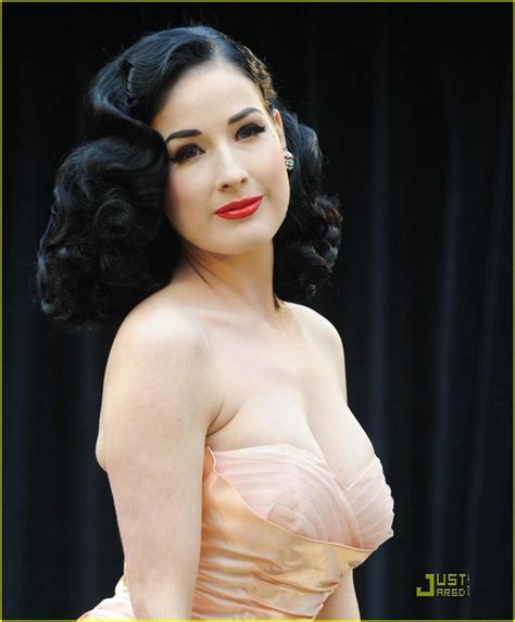 The quality, state, or degree of being feminine or womanly. "Dita Von Teese - Intelligent, well-spoken, well ...