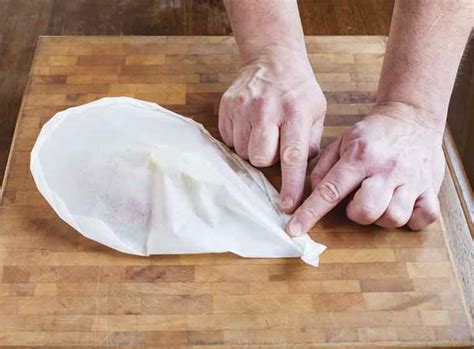 Make this quick halibut recipe that cooks the fish in parchment paper for a delicious meal. How to Bake Halibut in Parchment Paper | Thrifty Foods