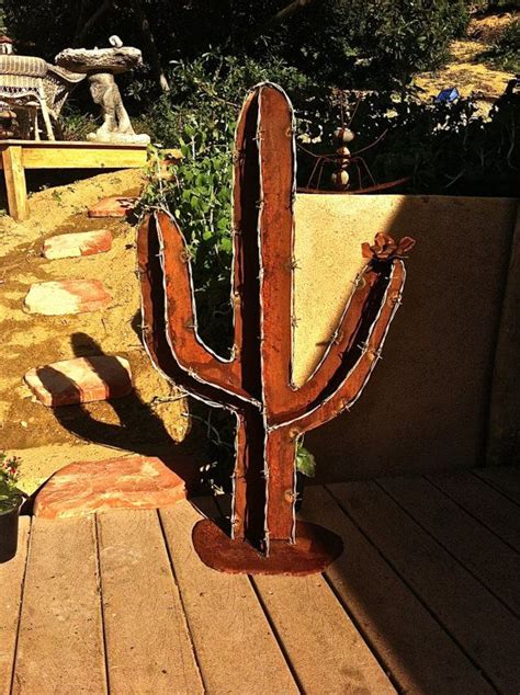 These blooming cactus add a decorative element to your space and give that natural look to your living spaces. Barb Wire Cactus, Saguaro, Rustic Cactus, Metal Garden ...