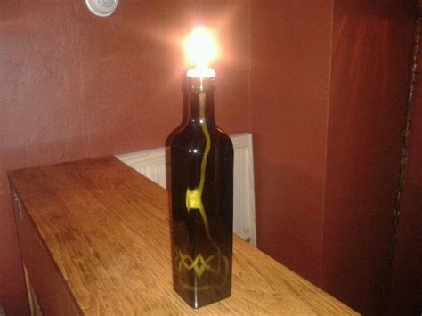 Megan.nyhan favorited homemade oil lamp! Homemade oil lamp using an olive oil bottle! | Oil lamps ...