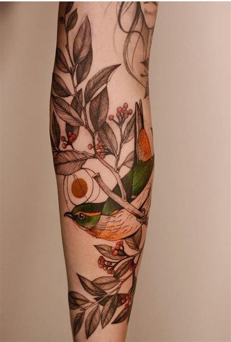 The earth tattoo holds very special meaning to the wearer and symbolizes his/her love for their origin which is the earth. Joanna Swirska Dzo Lama bird Tattoo | Earthy tattoos, Arm ...