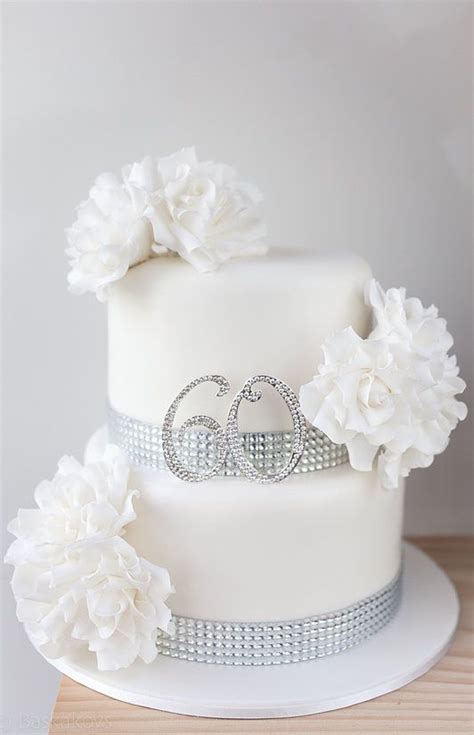 The video starts in 1916, when cakes were super simple — just a single white tier with some white flowers on top. 60th Wedding Anniversary Cake | 60 wedding anniversary cake, Wedding anniversary cake, 60 ...