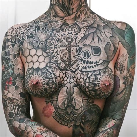 Some of the latest tattoo designs include lace, flowers, characters, and tribal motifs. 30 Intimate Breast Tattoos | Amazing Tattoo Ideas - Page 2