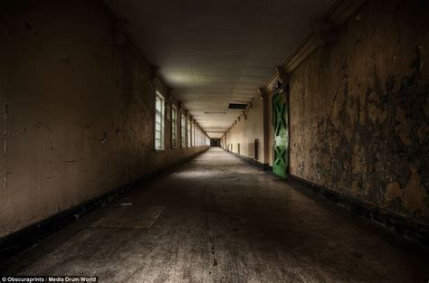 Or contemplate the silent freeway? Haunting images reveal abandoned Victorian-era asylum's ...