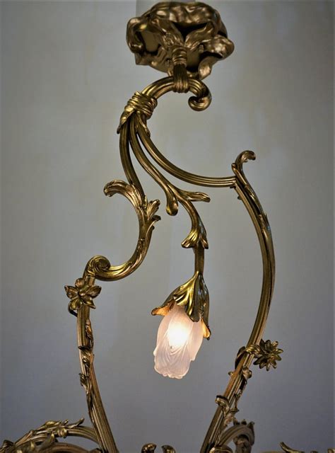 Custom private residence handmade glass chandelier. French Art Nouveau Bronze and Blown Glass Chandelier For ...
