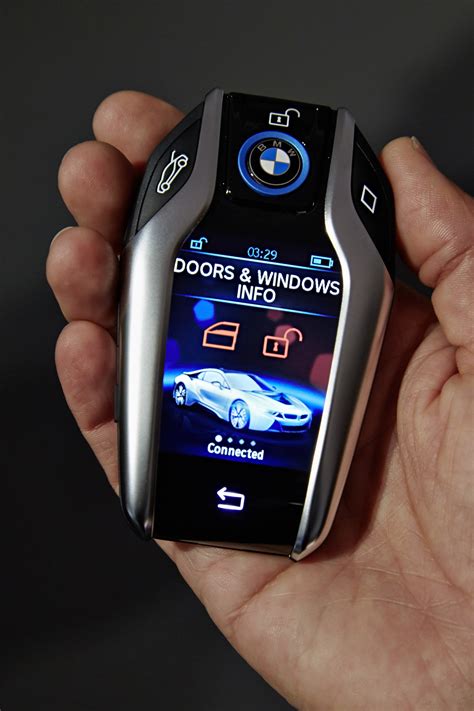 The bmw i8 key allows you to shut your windows, see how much charge you have and pre set your aircon, oh yes and don't forget. i8 Key Fob with 2.2" Display Brought Out by BMW at 2015 ...