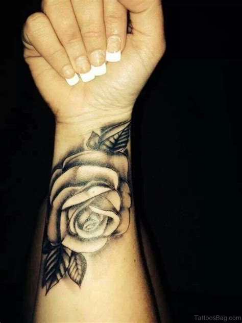 Roses are not just a beautiful flower but are popular choice for both women and men for a tattoo since the 1930's; 52 Wrist Colorful Rose Tattoo Designs