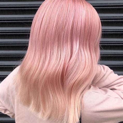 And it is quickly becoming the most popular treatment at the almost black hair fades gracefully down to a warm brown color, almost verging on an auburn 23. @hair.by.craig_parkinson's pastel pink balayage is giving us ALL the #MeanGirlsDay hair goals ...