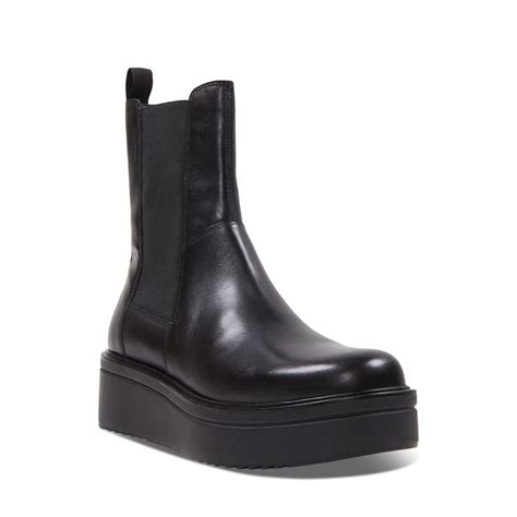 The tara is a wearable statement and this iteration comes with textured collar, chunky find in store. Women's Tara Chelsea Boots in Black | Little Burgundy