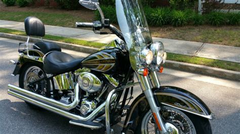 When the twin cam came out in 1999 i bought an electra glide classic. DELUXE vs Heritage Road King Street Glide Fatboy Electra ...