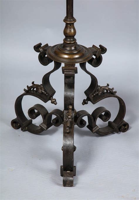 Our attractive scrolled hose hanger is hand made from wrought iron. Massive Pair of Wrought Iron and Bronze Floor Lamps For ...