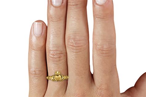 To wear a claddagh ring on the right hand with the crown turned inward, towards you symbolizes that the wearer is being courted in a relationship. How to wear a Claddagh ring - The Bench | Cookongold