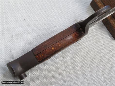 Home japanese militaria japanese wwii arisaka bayonet leather frog w brass fittings (repro). WW2 Japanese Type 30 Arisaka Bayonet with Leather Frog