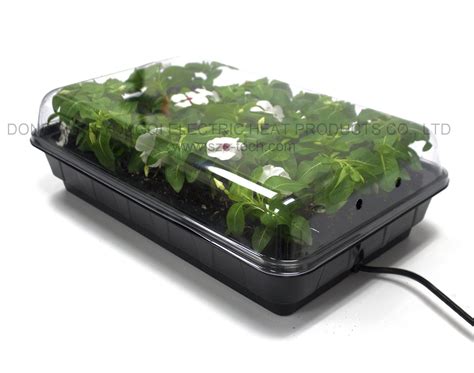 Raise the germination and rooting area temperatures approx. China Ce ETL Approved Seedling Heated Tray Plants Heating ...