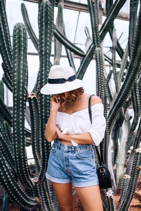 Trace a line from the center of the neckline to about 1″ above the top of the seam of each shoulder. DIY off the Shoulder Shirt (Takes Less Than a Minute!) | A Pair & A Spare