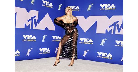 Her fresh good looks are aided by the fact that she is still young and does not require the magic of brushes to preserve her beauty. Miley Cyrus's Mullet Haircut and 80s Glam at MTV VMAs 2020 | POPSUGAR Beauty Australia Photo 2