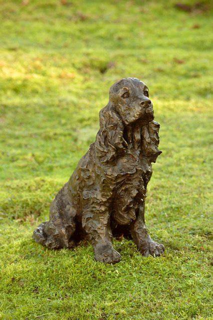 Our bronze dog statue features an english cocker spaniel resting on its belly while staring lovingly at its owner. Have you met Polly by Rosemary Cook? View more #sculptures ...