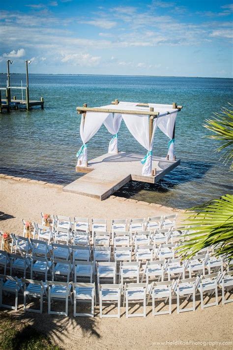 The pair both wore white gowns with sweetheart necklines and differing belts. Wedding Venue Corpus Christi | Beach wedding packages ...