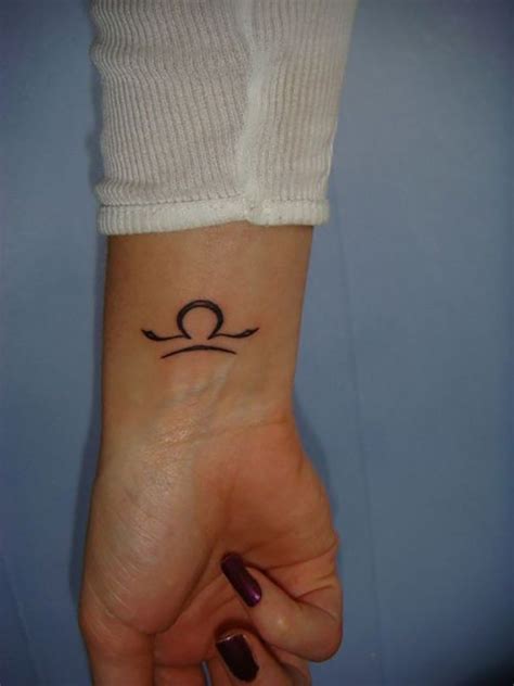 Cute tiny libra tattoo on wrist. libra zodiac tattoo on wrist | Libra tattoo, Tattoos, Cute ...