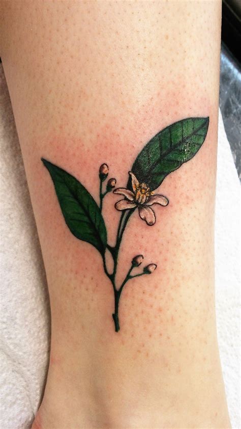 Maybe you would like to learn more about one of these? cute and delicate orange blossom tattoo on the ankle by ...