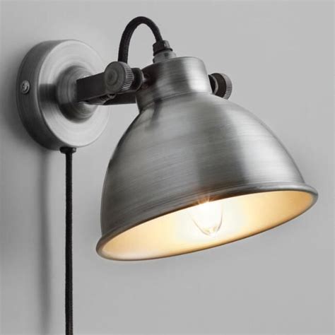 Accent lamps not only brighten up the room but also double up as decor for your living room. Aged Zinc Ethan Wall Sconce | World Market (With images) | Farmhouse wall sconces, Wall sconces ...