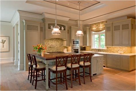 Portable kitchen islands that could be used where a big island will not fit, two tier kitchen islands with furniture like features, and other kitchen island ideas with seating. 10 Harmonious Kitchen island with Storage and Seating ...