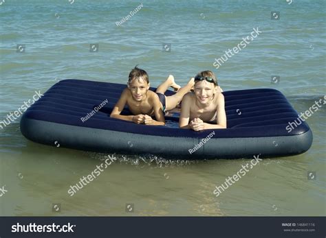 Also, enjoy private labeling and reliable delivery. Two Little Boys Floating On Air Mattress Stock Photo ...