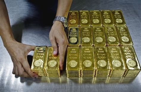 Update with gold rate today dubai , live dubai gold rates today. A technician prepares 1-kg gold bars of 995.0 purity to ...