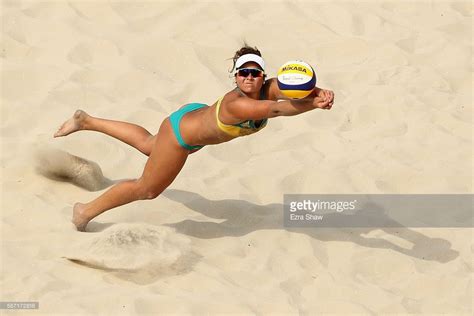 Mariafe artacho del solar is an australian beach volleyball player. Mariafe Artacho del Solar of Australia dives during the ...