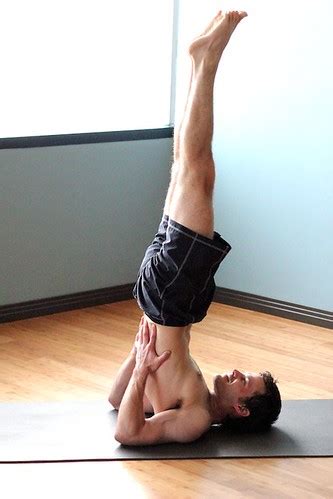 The important thing to remember is which leg to lower first. Sarvangasana (Shoulder Stand) | www.nathanyoga.com - Shoulde… | Flickr