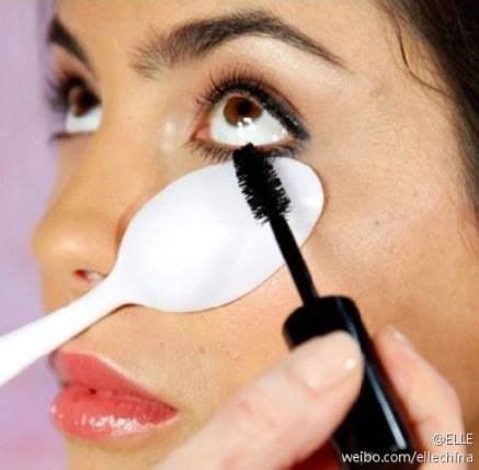 Place the same brush over the line. Use a plastic spoon to easily apply mascara on your bottom lashes without getting any on the ...