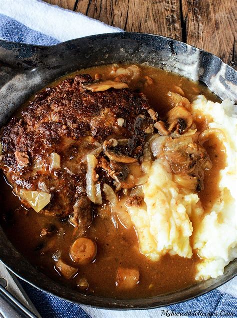 Hamburger steak with a brown onion gravy.submitted by: Old Fashioned Hamburger Steaks with Mushroom Onion Gravy ...