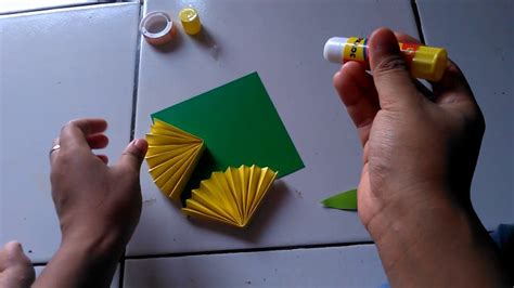 1.12 bunga dari kertas buffalo; Pembuatan bunga matahari dari kertas origami - YouTube